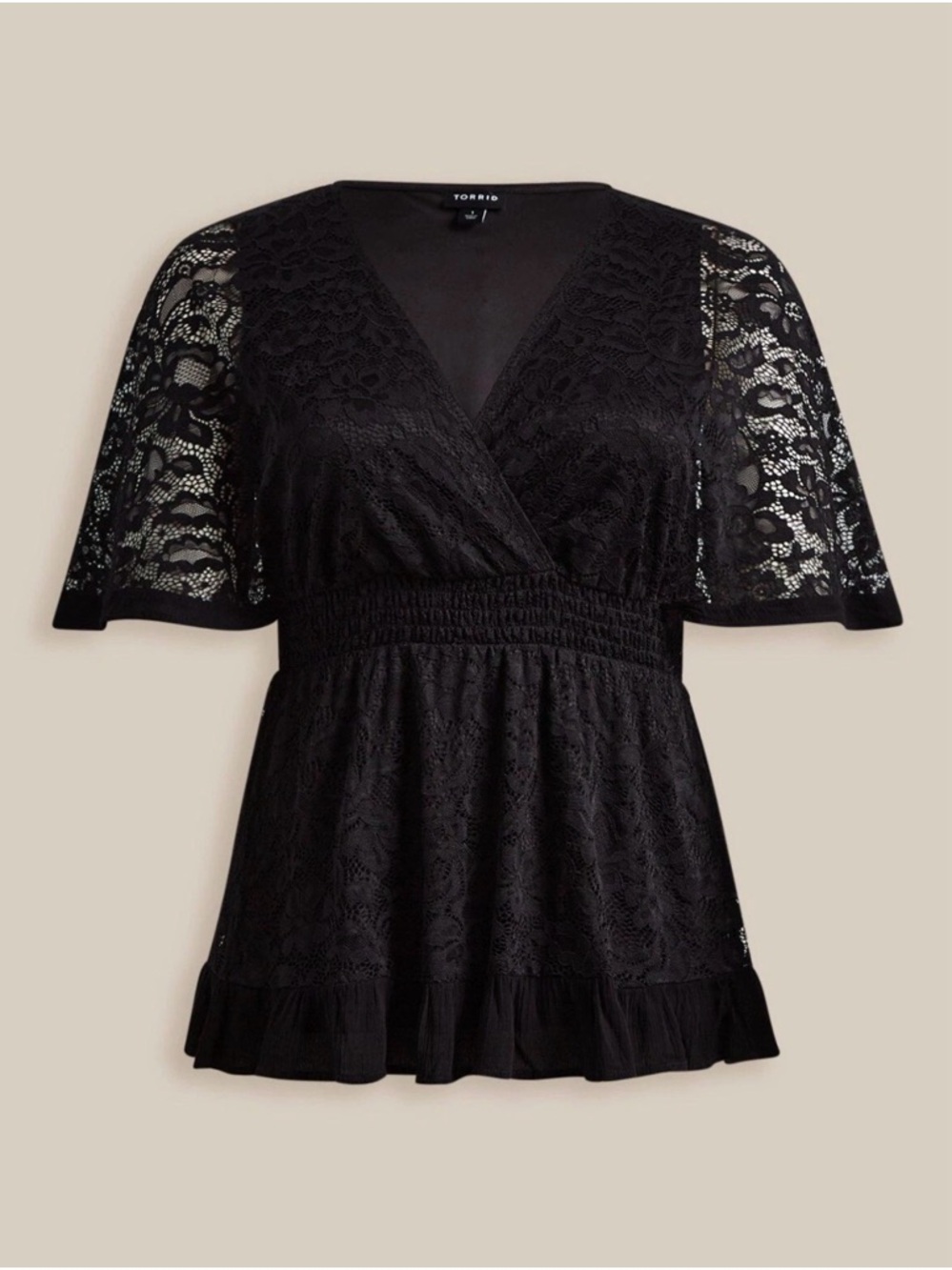 NWT - NEVER WORN
Torrid  Stretch Lace Surplice Dolman Sleeve Top